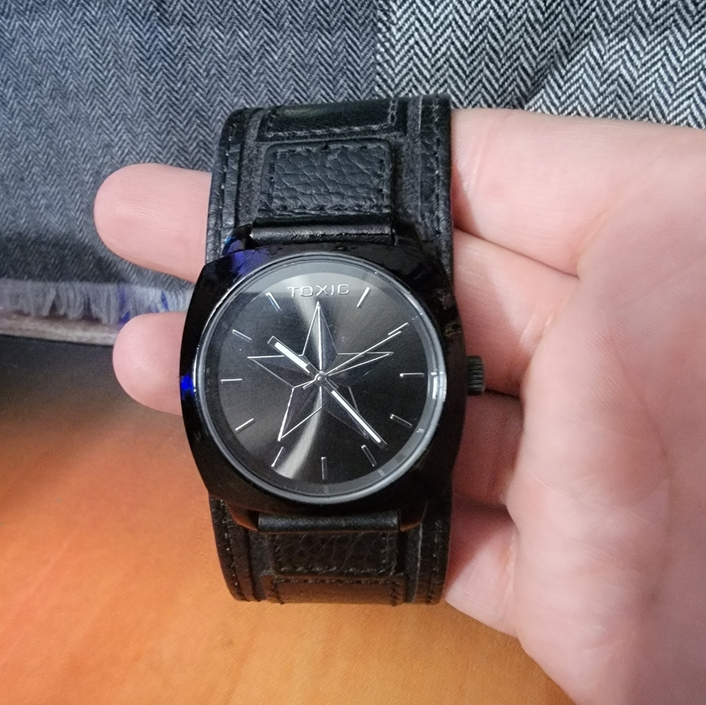 Toxic black nautical star watch.